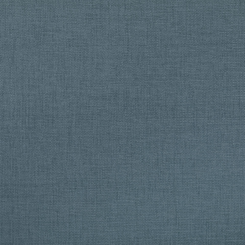 Close-up of blue, textured fabric with tight weave.