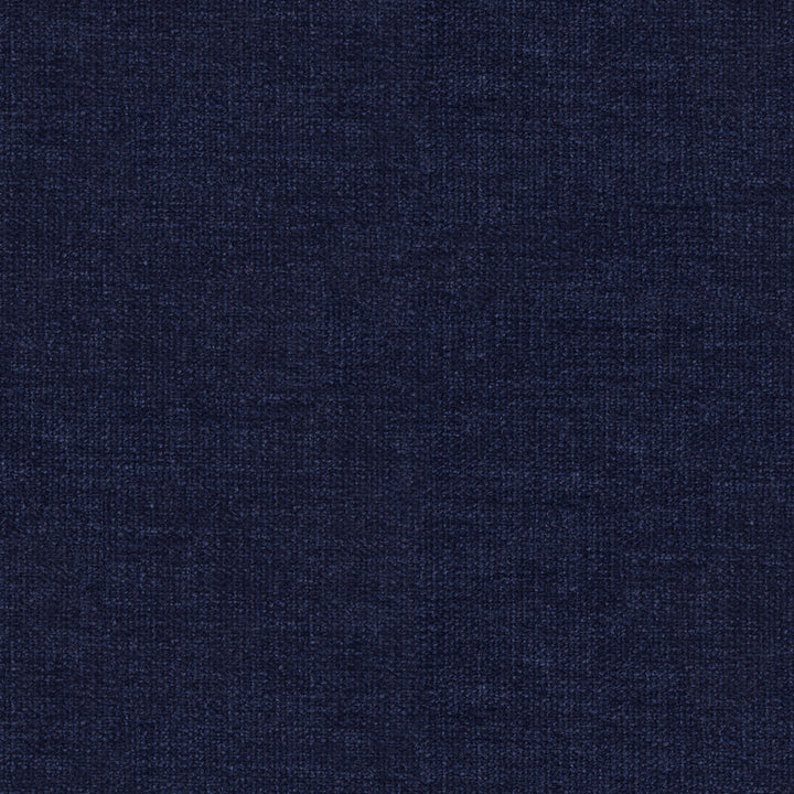 Close-up of deep blue textured fabric resembling denim material.