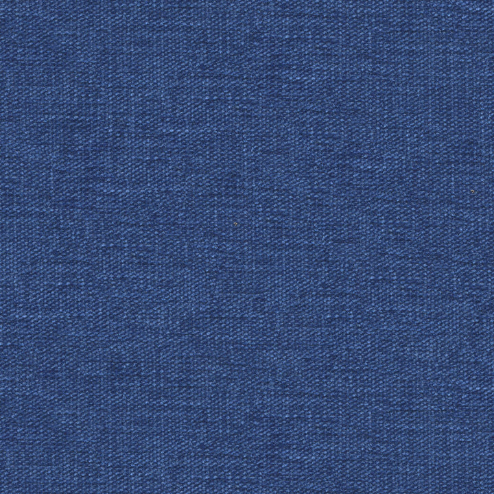 Close-up of textured denim fabric showcasing its iconic blue hue