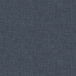 Close-up of blue denim fabric, showcasing characteristic ribbing and texture.