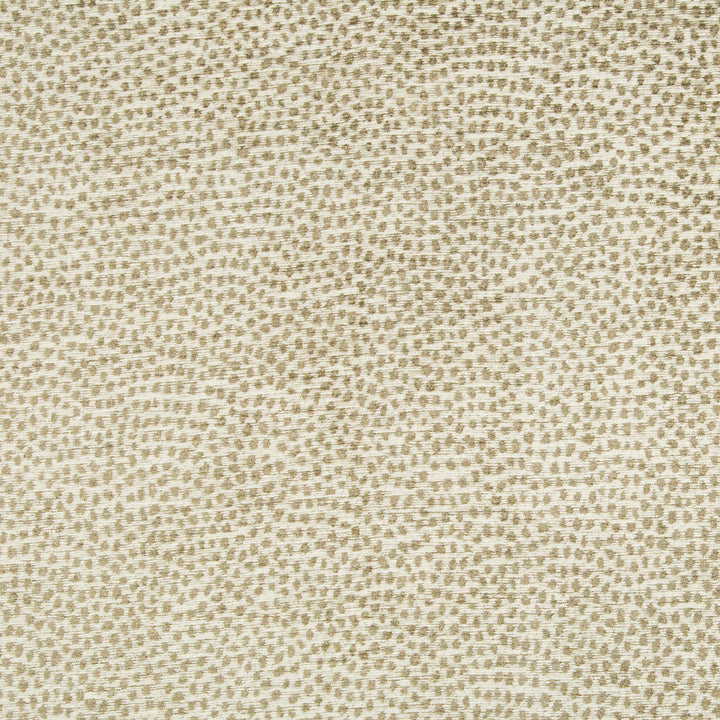 Close-up view of textured fabric with geometric pattern and neutral colors.