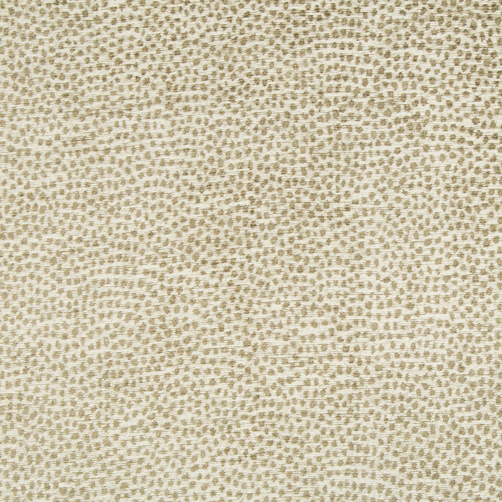 Close-up view of textured fabric with geometric pattern and neutral colors.