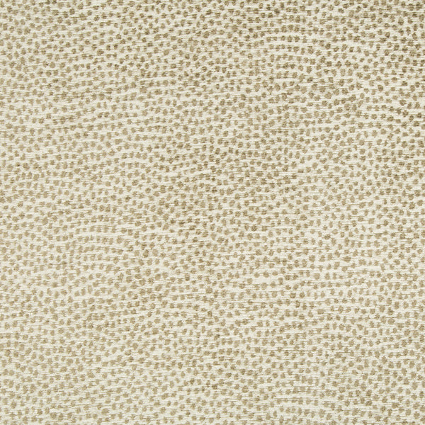 Close-up view of textured fabric with geometric pattern and neutral colors.
