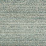 Textured fabric with intricate weave pattern in shades of blue.