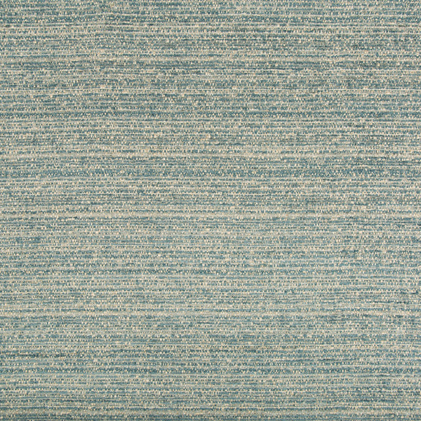 Textured fabric with intricate weave pattern in shades of blue.