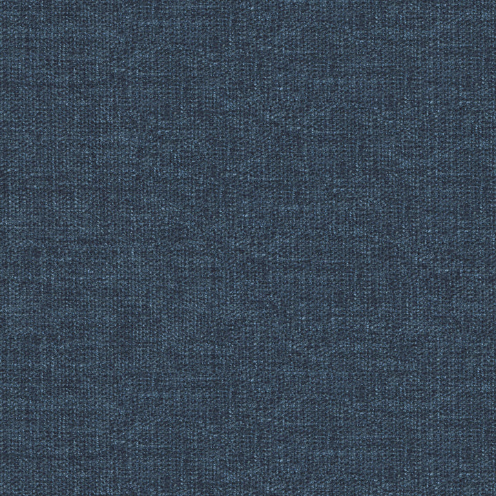 Close-up of denim fabric showcasing detailed weave and characteristic blue color.