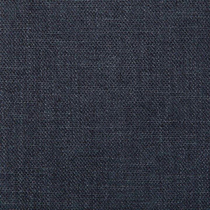 Close-up of denim fabric showcasing diagonal ribbing and textured appearance.