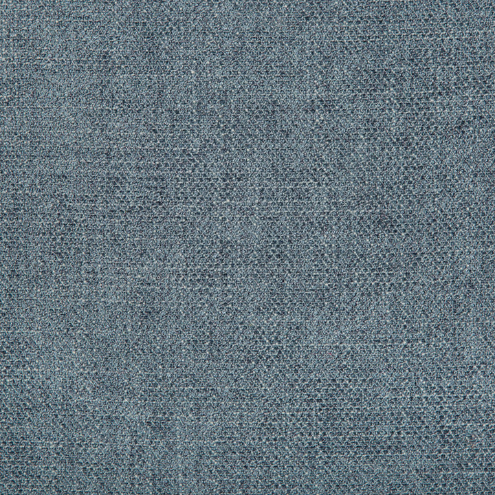 Close-up of denim fabric showcasing its durable and textured design.