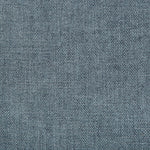 Close-up of denim fabric showcasing its durable and textured design.