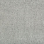 Close-up of a fine, grainy textured surface in neutral grey.