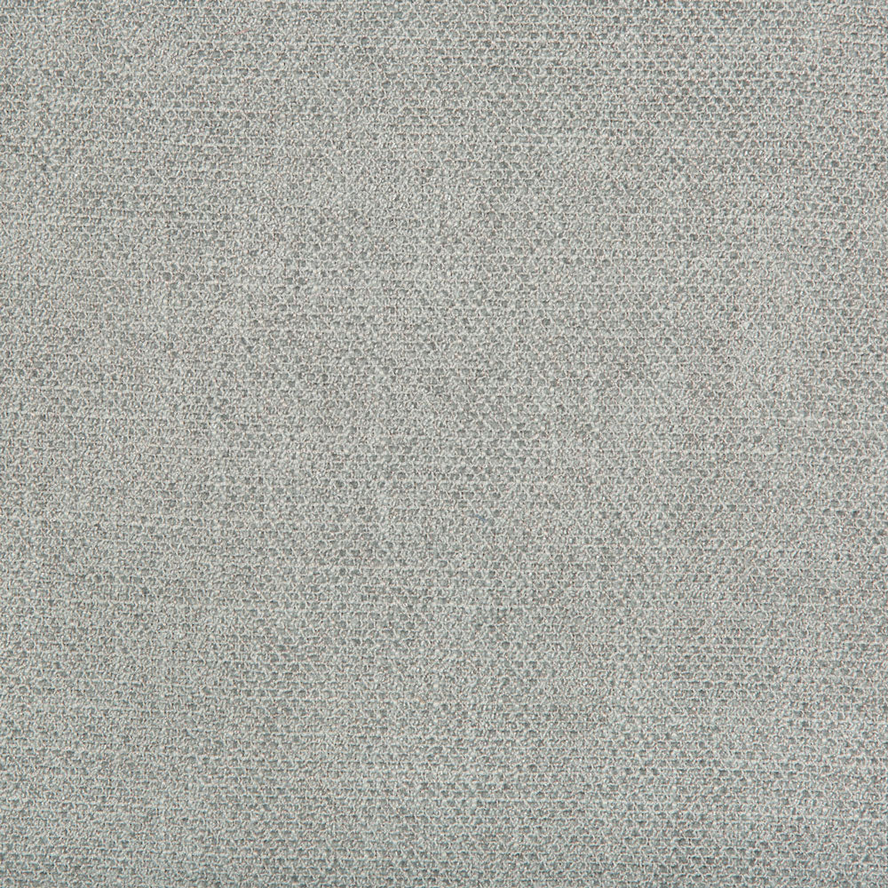 Close-up of a fine, grainy textured surface in neutral grey.