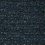 Close-up of durable, speckled fabric in dark blue shades for upholstery or carpeting.