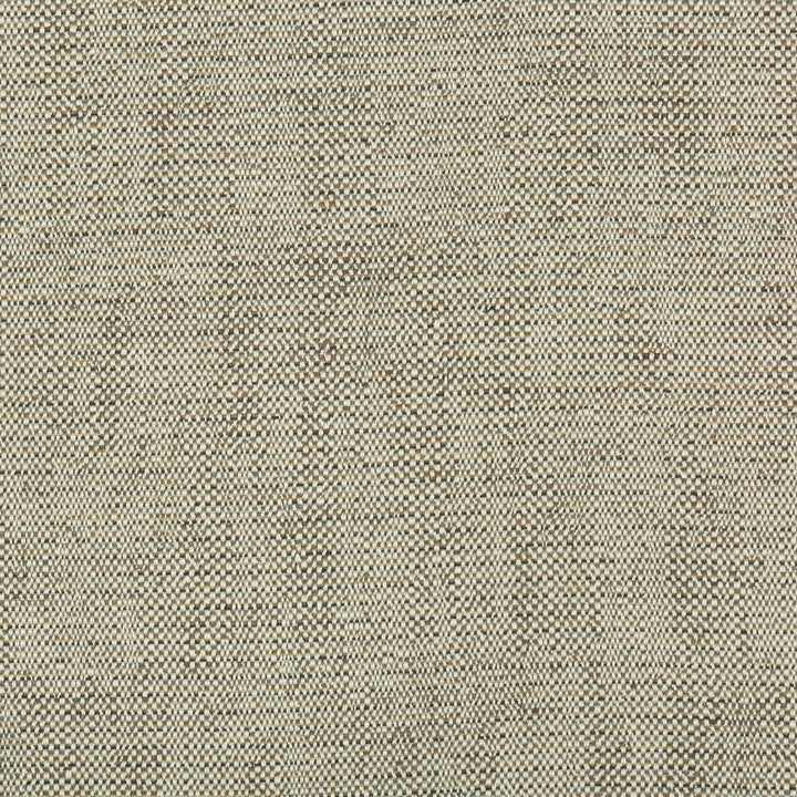 Close-up view of textured fabric with speckled granular effect.