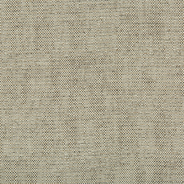 Close-up view of textured fabric with speckled granular effect.