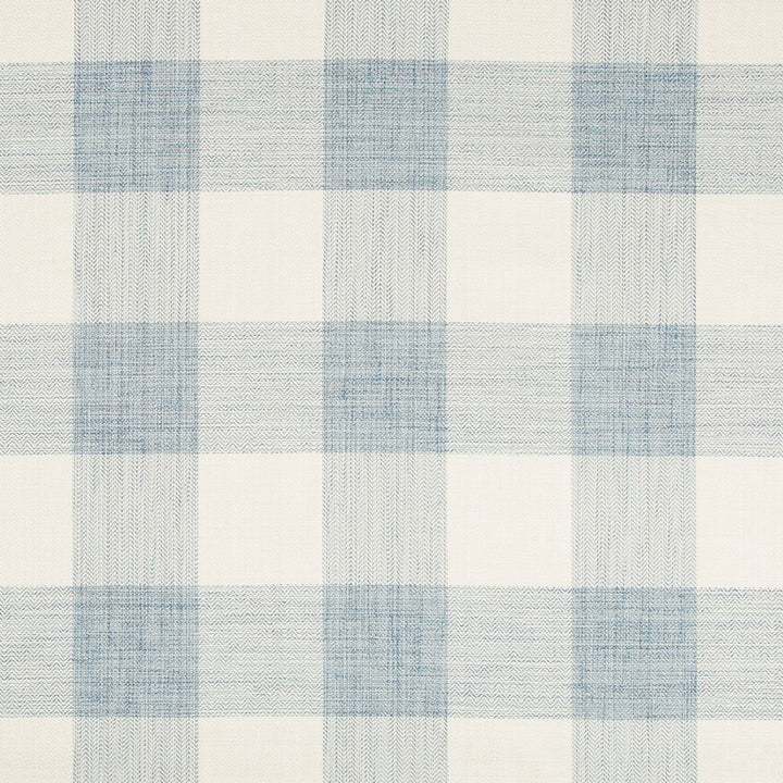 Close-up of soft blue and white plaid fabric with herringbone texture.