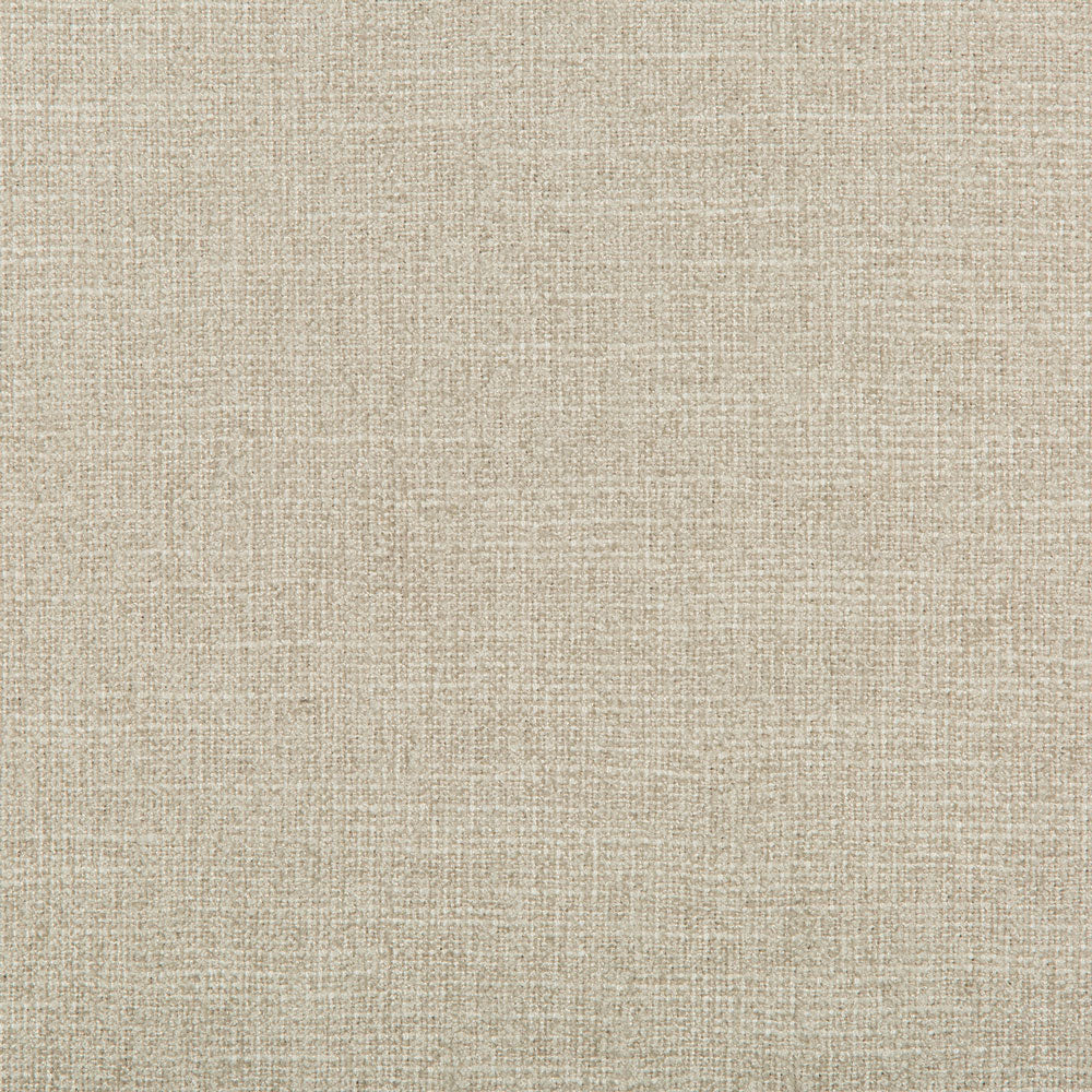 Close-up of textured fabric in light beige with woven appearance.