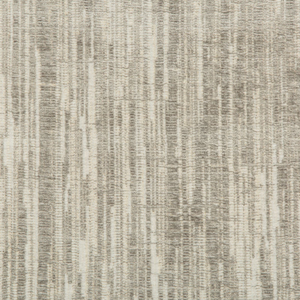 Close-up of a neutral, variegated fabric with a rough texture.