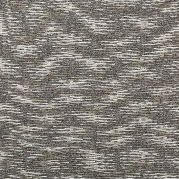 Close-up of textured fabric with alternating light and dark stripes.