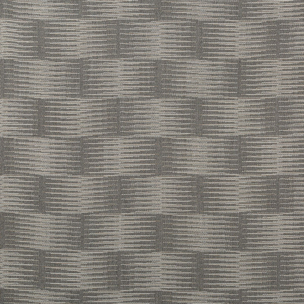 Close-up of textured fabric with alternating light and dark stripes.