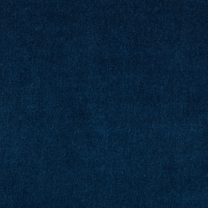 Close-up of textured, deep blue material with diagonal ribbing pattern.