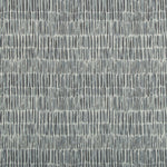 Abstract patterned fabric with vertical streaks in shades of grey.