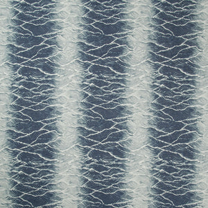 Abstract fabric design showcases ocean-inspired waves in soothing blue tones.