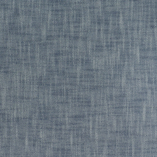 Close-up of a blue and white woven fabric with intricate pattern.
