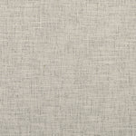 Close-up of a textured fabric showcasing a monochromatic, looped pattern