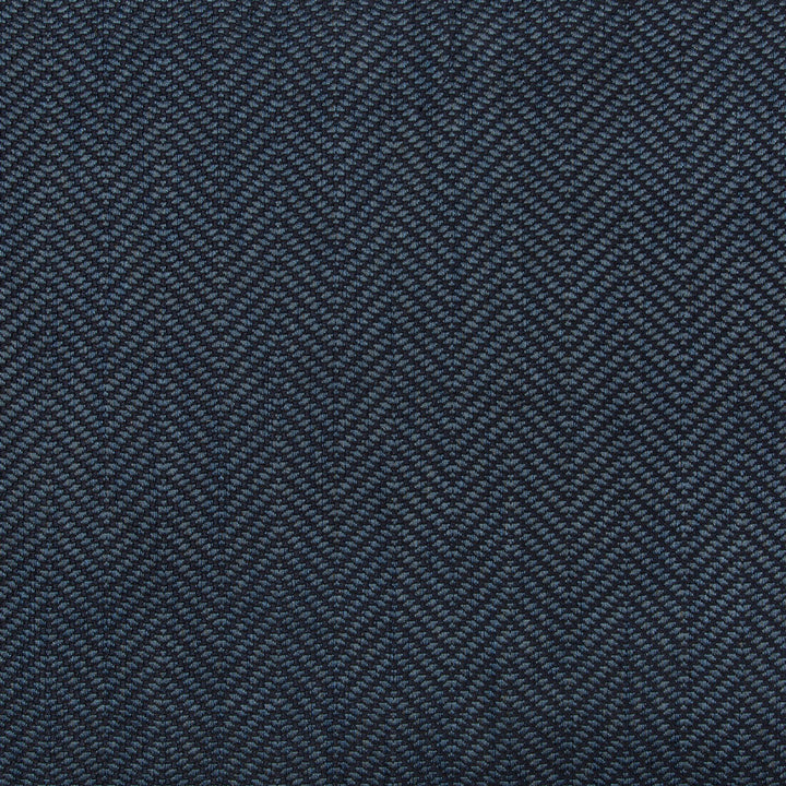 Close-up of herringbone fabric in textured blue pattern for textiles.
