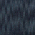 Close-up of herringbone fabric in textured blue pattern for textiles.