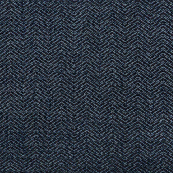 Close-up of herringbone fabric in textured blue pattern for textiles.