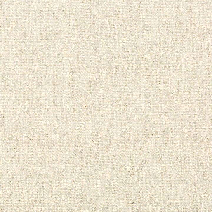 Close-up of beige fabric with visible weave and textured pattern.