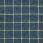 Patterned fabric with a navy plaid design, featuring intersecting lines.