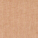 Close-up of a herringbone fabric with orange threads, textured appearance.