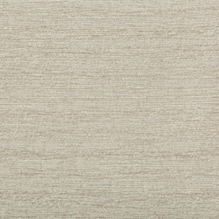 Textured fabric swatch in neutral beige with subtle woven pattern.