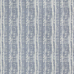 Textile with distressed vertical stripe pattern in gray and off-white.