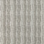 Textured fabric with gray vertical stripes and organic white streaks.