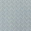Close-up of a textured herringbone fabric in light blue and white.