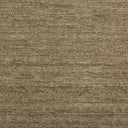 Textured fabric with a coarse weave in earthy tones.