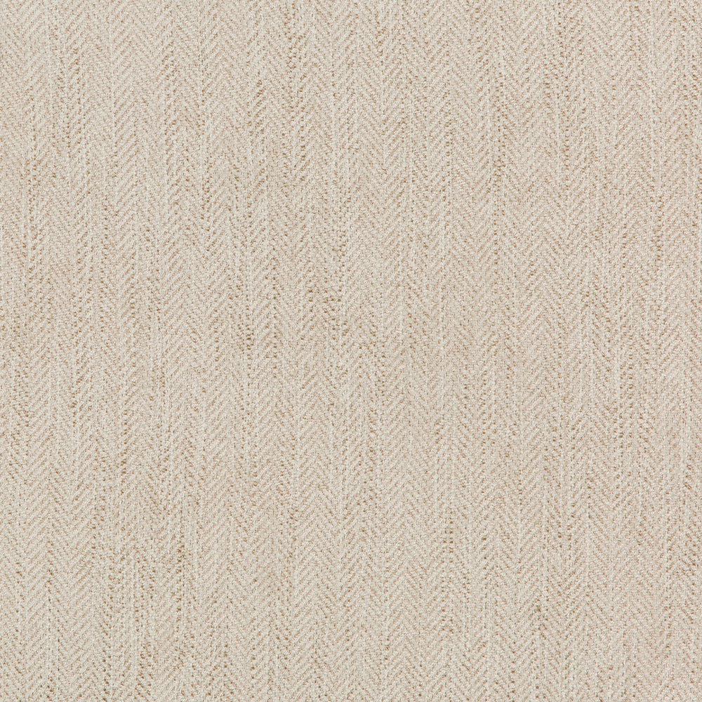 Close-up of high-quality herringbone fabric in neutral beige color.