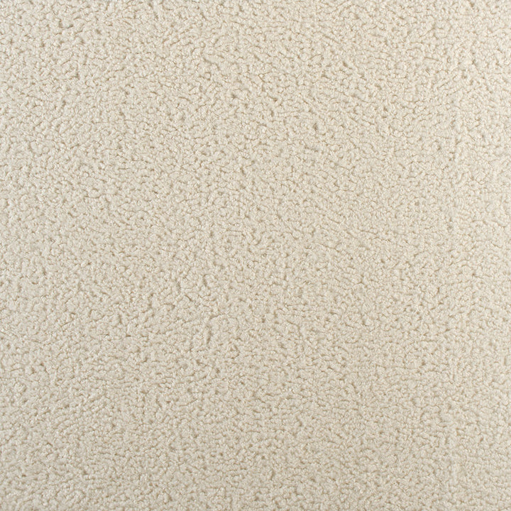 Close-up of a creamy beige carpet with uniform textured pile.