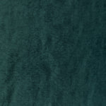 Close-up of a deep green plush fabric with soft texture.