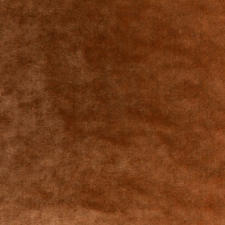 Textured brown surface with varying shades, resembling fabric or leather.
