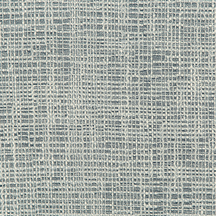 Close-up of a sturdy machine-made fabric with blue and white weave.