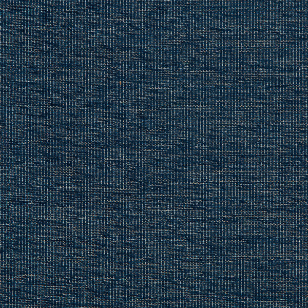 Close-up of dark blue denim fabric with twill weave pattern.