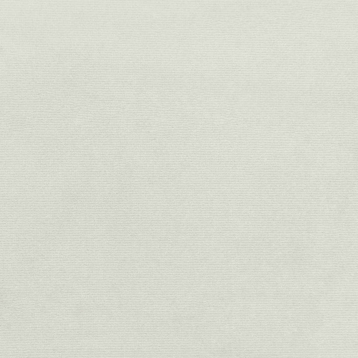 Close-up of a plain, textured surface resembling fabric or canvas.