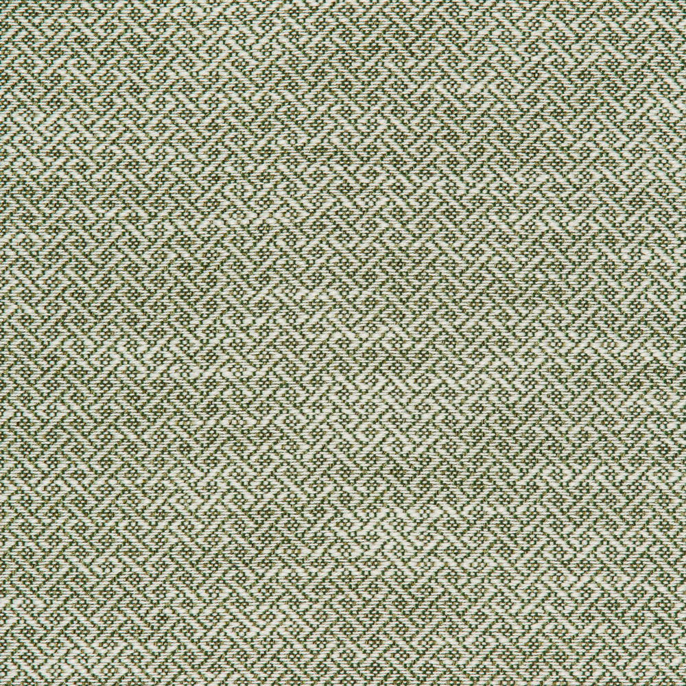 Close-up of houndstooth fabric with intricate, abstract four-pointed shapes.