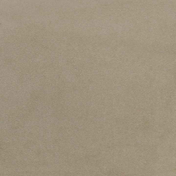 Close-up of a textured beige fabric with a rough weave.