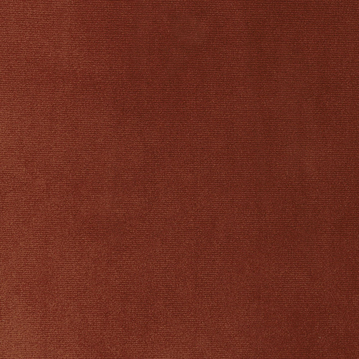 Close-up view of reddish-brown textured fabric with fine weave.