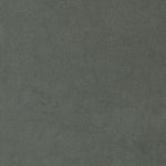 Close-up of a dark grey textured surface resembling woven fabric.